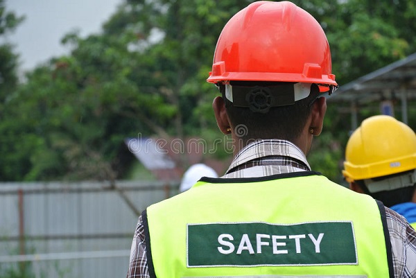 Why do construction workers wear safety vests
