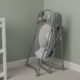Graco Slim Spaces Reign Baby Swing folded compactly for easy storage in small nursery